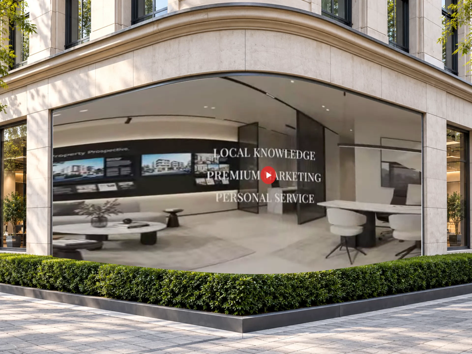 Curved corner billboard showing a property campaign